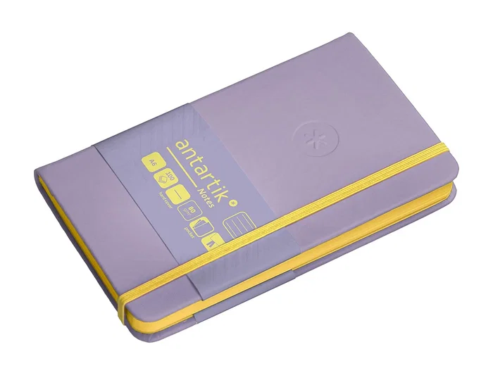 Antartik Cuaderno A6 Tapa Dura 100 Hojas Rayas Morado y Amarillo 80gr FSC