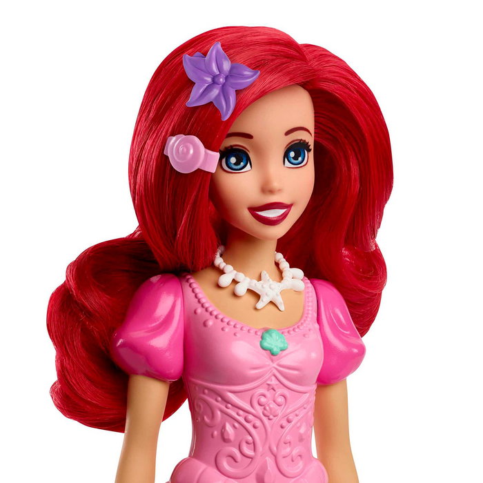 Mattel HLX34 Muñeca Ariel Disney La Sirenita de moda articulada con vestido rosa, pelo largo y accesorios para peinar
