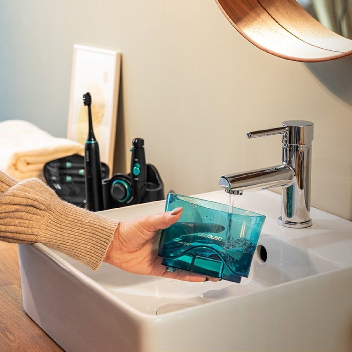 Cepillo de Dientes Eléctrico + Irrigador Dental Cecotec ToothCare Jet Clean Azul Negro Cepillo de Dientes Eléctrico + Irrigador Dental Cecotec ToothCare Jet Clean Azul Negro