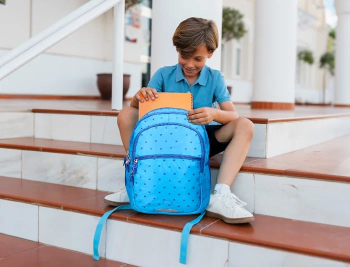 Liderpapel Mochila escolar multibolsillo para portátil azul cruces