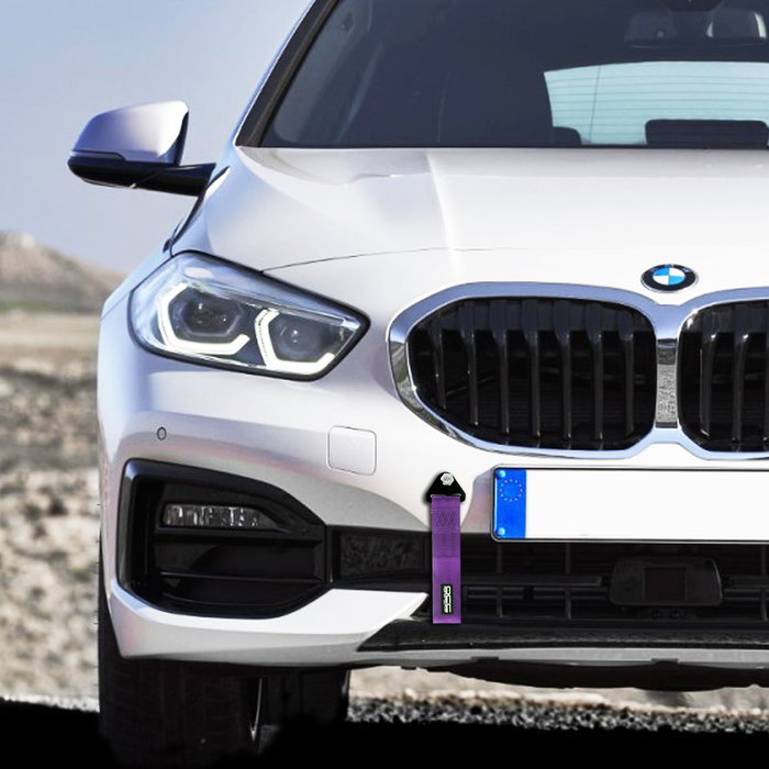 Occ Motorsport Cinta de Remolque Morada OCCRC012 - Punto de Tiro Resistente hasta 3000 kg, 25 x 5 cm, Soporte Metálico, Montaje Rápido