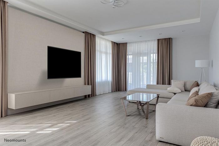 Neomounts WL40-550BL16 Soporte Pared Pantalla Completo Movimiento, 40-65", Max 40 kg, VESA 200x100-600x400, Fácil Instalación - Negro