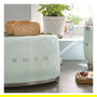 Smeg TSF01PGEU Tostadora de 2 Ranuras, 950W, Pastel Verde, Acero Inoxidable, Control por Botones, Función Descongelar y Recalentar, Bandeja Extraíble