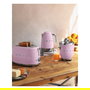 SMEG TSF01PKEU Tostador de 2 Rebanadas, Acero Inoxidable, Color Rosa Cadillac, 950 W, Control por Botones, Función Descongelar y Recalentar