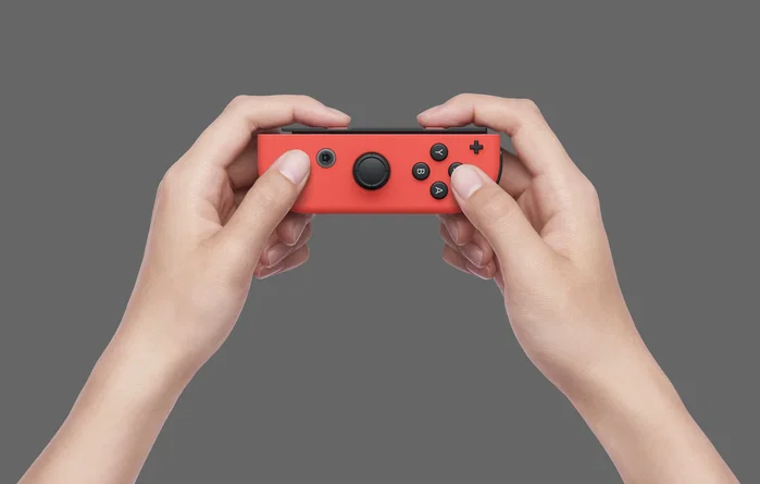 Nintendo Switch OLED con Joy-Con Azul y Rojo Neón, 64 GB