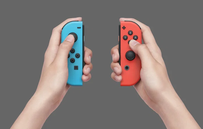 Nintendo Switch OLED con Joy-Con Azul y Rojo Neón, 64 GB
