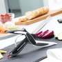 Innovagoods Cuchillo tipo tijera con mini tabla de cortar integrada