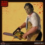 MEZCO TOYZ Figurine Leatherface - Massacre à la Tronçonneuse (Texas Chainsaw Massacre) - 9,5 cm