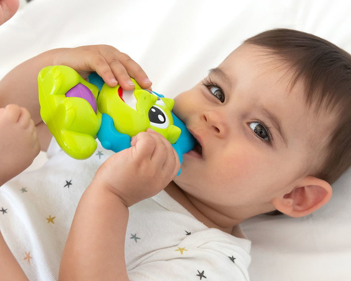 KioKids Mordedor Musical en Forma de Dinosaurio, Sonajero et Anneau de Dentition pour Bébé +3 Mois - Couleurs Vert et Bleu avec Mélodies