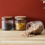 Home Deco Factory Bocal en verre avec relief et couvercle acacia 500 ml