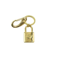 Guess Porte-clés en métal motif serrure Or RW7421 P2201