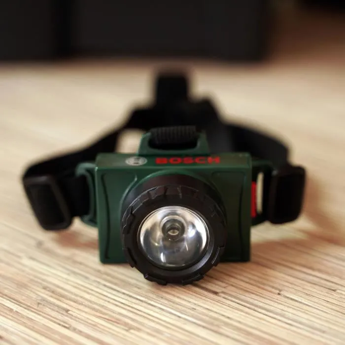 Theo Klein Lampe Frontale Bosch pour Enfants à Partir de 3 Ans, 2 Modes d'Éclairage, Portée 8 m, Fonctionne avec 2 Piles AA (non Incluses), Élastique Ajustable