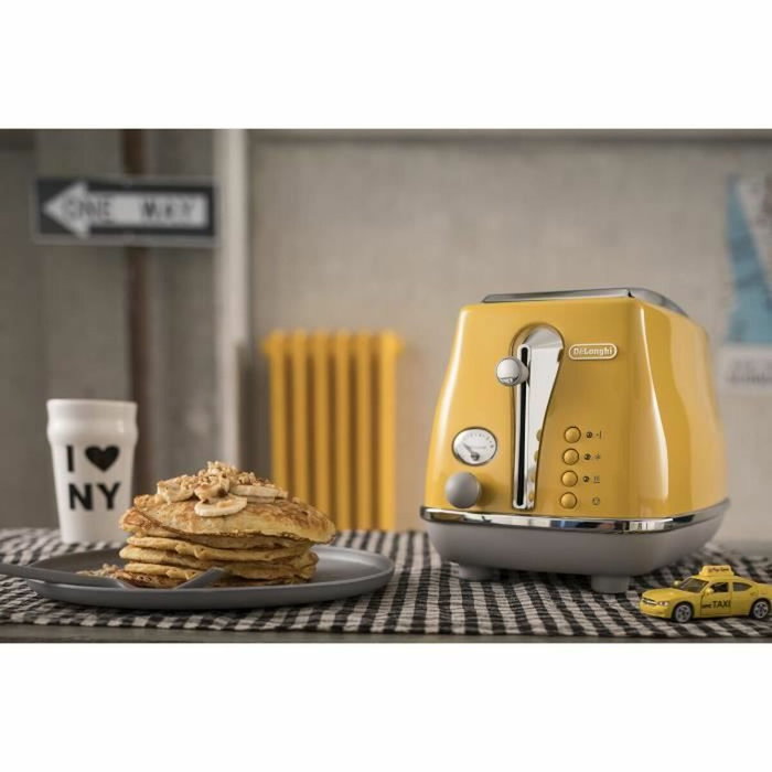DeLonghi Icona Capitals Grille-pain Jaune 2 tranches 900W