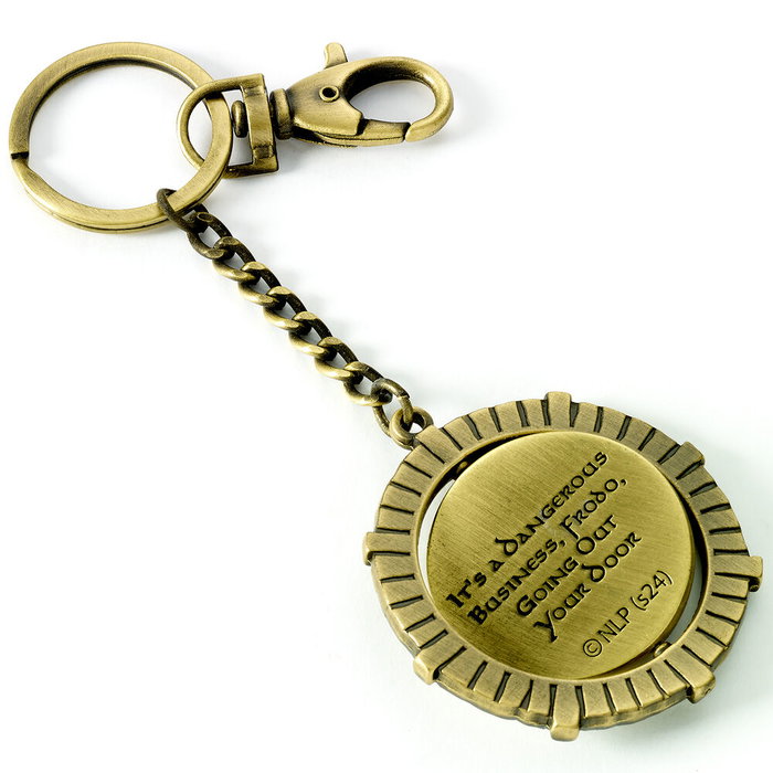 THE CARAT SHOP Porte-clés La Comté Le Seigneur des Anneaux avec message secret rotatif en alliage de zinc