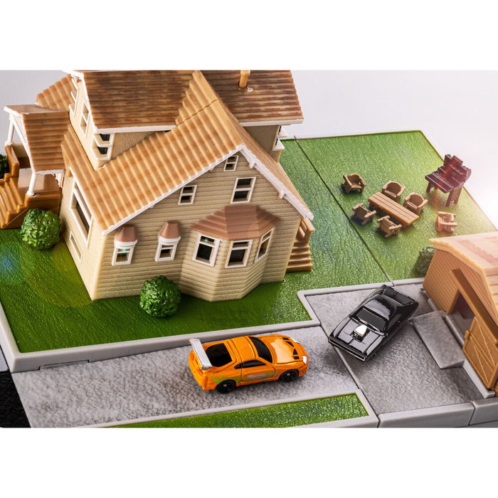 Jada Toys Fast & Furious - Réplique du garage Toretto Diorama, set avec garage et zone extérieur + 2 voitures métalliques à l'échelle nano (Dodge Charger et Toyota Supra)