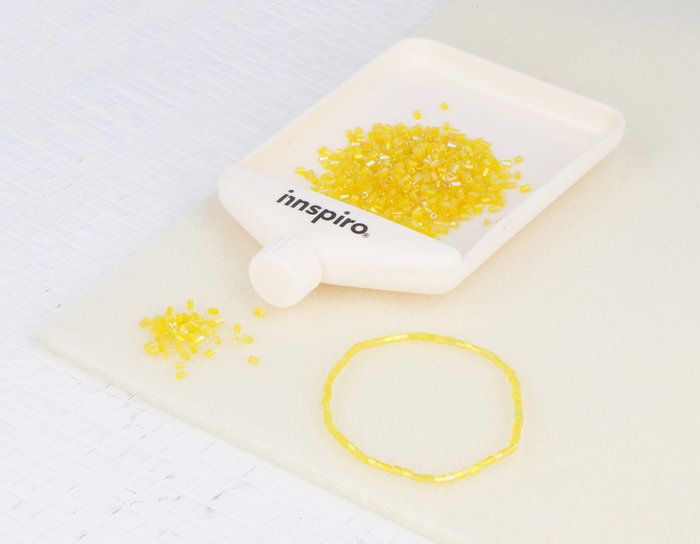 Innspiro Rocaille de verre cylindre mini aurora boreale jaune 2x2mm 100g