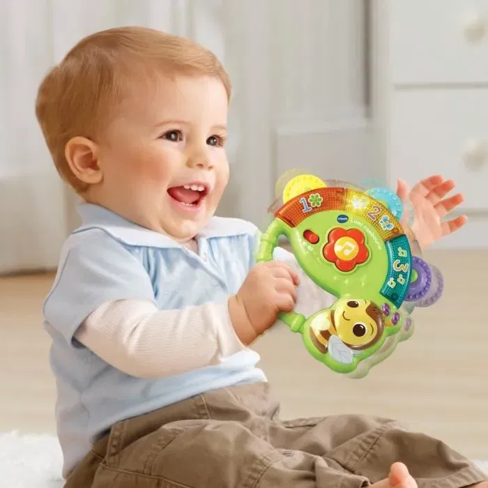 Vtech Tambourin Lumi VTech Baby - Jouet d'éveil musical lumineux interactif avec chiffres, sons, chansons, bouton Fleur et capteur de mouvement pour bébé