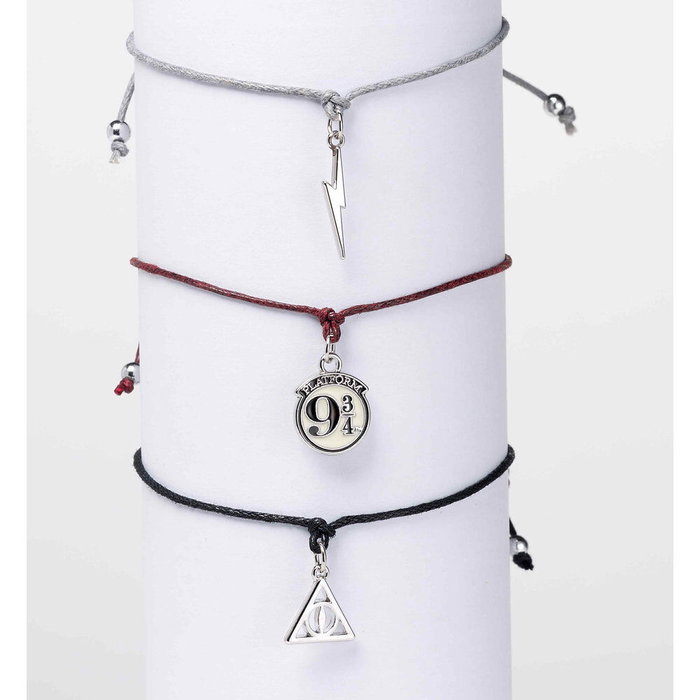 THE CARAT SHOP - Set de 3 bracelets de l'amitié Harry Potter - Reliques de la Mort, Éclair, Plaque 9 3/4 - Alliage de zinc et nylon