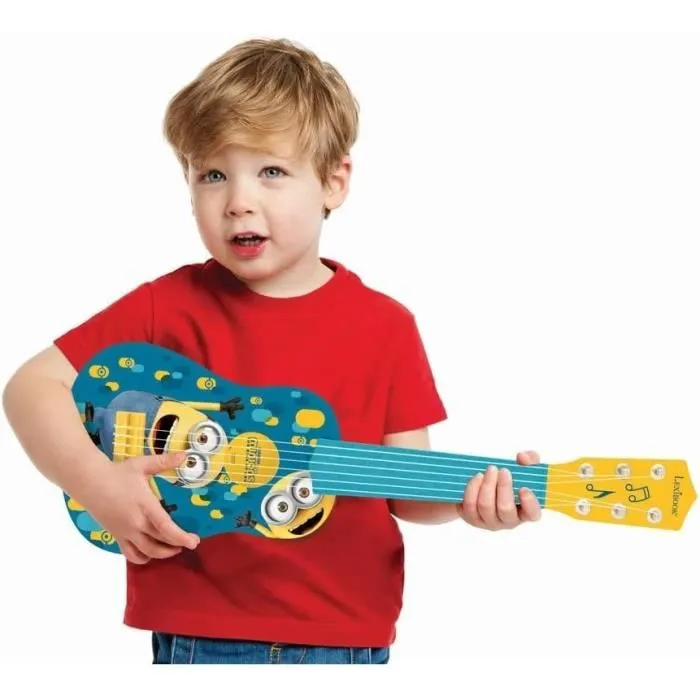 Lexibook Ma Première Guitare Les Minions - Guitare d'initiation pour enfant 3 ans et plus, 6 cordes, 53 cm, plastique léger avec guide d'apprentissage Lexibook Ma Première Guitare Les Minions - Guitare d'initiation pour enfant 3 ans et plus, 6 cordes, 53 cm, plastique léger avec guide d'apprentissage