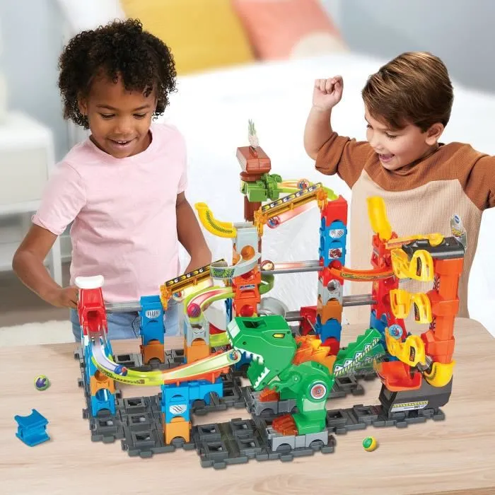 VTech Marble Rush Dino Adventures Magnetic Set XL400E - Circuit de billes magnétiques avec dinosaures - 100 pièces et 10 billes - Version française