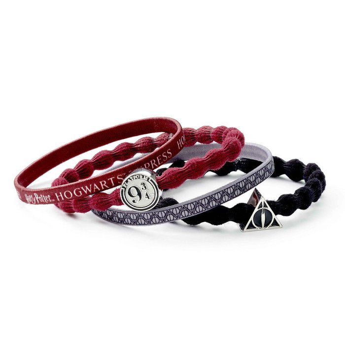 THE CARAT SHOP - Blister de 4 Bracelets à Fermoir Plateforme 9 3/4 Harry Potter - Polièster, Caoutchouc, Alliage de Zinc