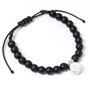 THE CARAT SHOP - Bracelet Officiel Real Madrid extensible avec perles noires mate et médaillon logo club - Pour homme et femme