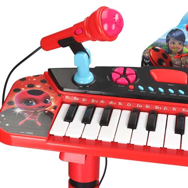 Reig - Orgue enfant avec microphone et banquette Lady Bug, jouet musical en plastique pour enfants à partir de 3 ans (18.3 x 17.5 x 6.5 cm)