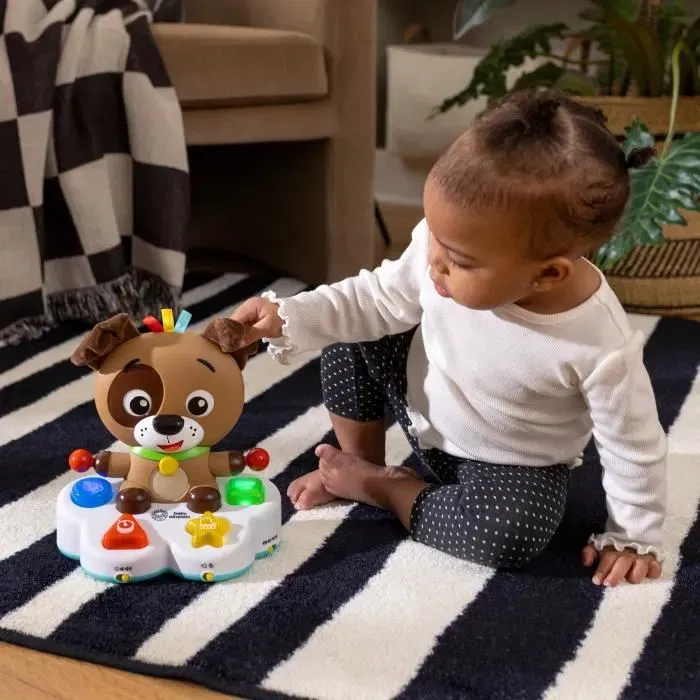Baby Einstein - Jouet d'éveil musical et sensoriel Dean le chien, avec tambour, lumières et apprentissage multilingue pour bébé de 6 mois et plus