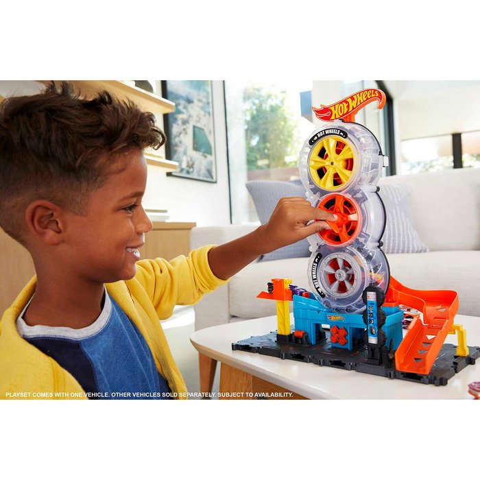 Hot Wheels - Circuit City Tienda de Neumáticos HDP02 avec magasin de pneus, rampe et ascension manuelle - Jouet de course et cascade - Âge recommandé : +4 ans Hot Wheels - Circuit City Tienda de Neumáticos HDP02 avec magasin de pneus, rampe et ascension manuelle - Jouet de course et cascade - Âge recommandé : +4 ans