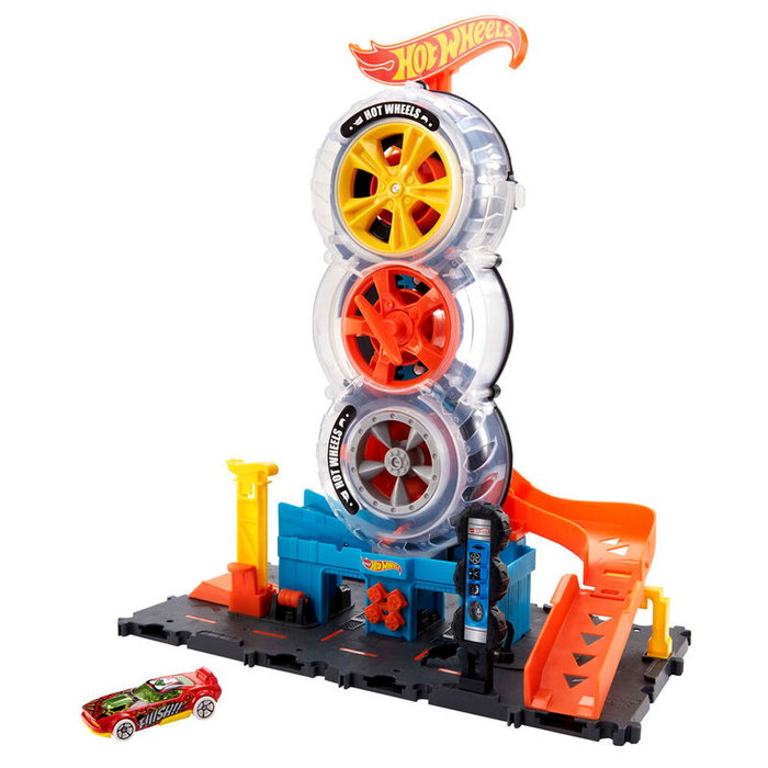 Hot Wheels - Circuit City Tienda de Neumáticos HDP02 avec magasin de pneus, rampe et ascension manuelle - Jouet de course et cascade - Âge recommandé : +4 ans