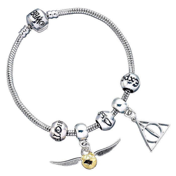 THE CARAT SHOP Bracelet argenté avec charms Deathly Hallows, Vif d'or et 3 Spellbeads - Collection Harry Potter