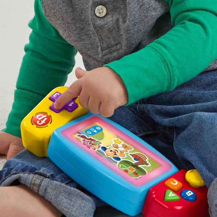 Fisher-Price Console vidéo éducative Rire et Apprendre HNL52 - Jouet interactif avec lumières, chansons, formes, couleurs - Langues : Espagnol, Anglais, Italien, Portugais Fisher-Price Console vidéo éducative Rire et Apprendre HNL52 - Jouet interactif avec lumières, chansons, formes, couleurs - Langues : Espagnol, Anglais, Italien, Portugais