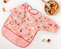 KioKids Babero bavette imperméable avec manches longues et bavette, couleur rose, pour bébé à partir de 4 mois, Vuelta al cole