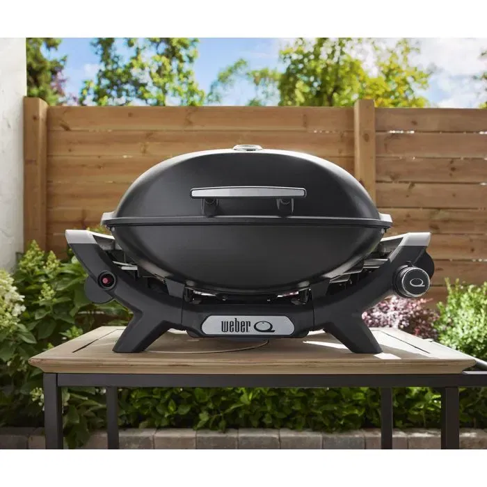 Weber Q2100N - Barbecue à gaz 1 brûleur, 2.94 kW, cuve et couvercle en fonte émaillée, grille en fonte émaillée, allumage piézoélectronique, noir Weber Q2100N - Barbecue à gaz 1 brûleur, 2.94 kW, cuve et couvercle en fonte émaillée, grille en fonte émaillée, allumage piézoélectronique, noir