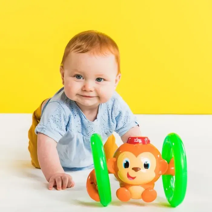 Bright Starts K52181 Jouet d'activité Singe Roll & Glow - Singe roulant lumineux et musical interactif pour bébé, favorise la motricité