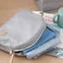Beaba - Trousse de toilette bébé en canvas gris perle avec anse et poches intérieures