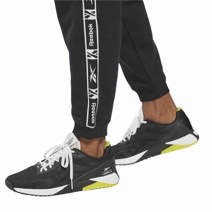 Pantalon de sport long Reebok Ri Tape Noir Pantalon de sport long Reebok Ri Tape Noir