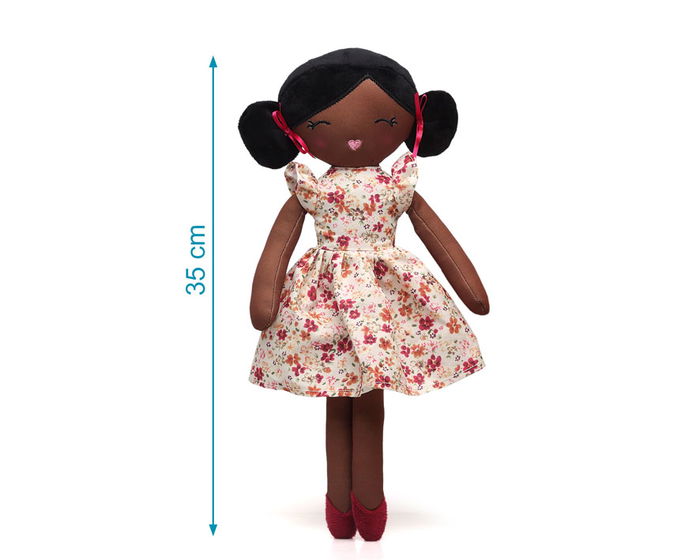 KioKids - Poupée de chiffon brune pour bébé +10 mois, 100% polyester, tenue fleurie avec rubans roses, douce et légère