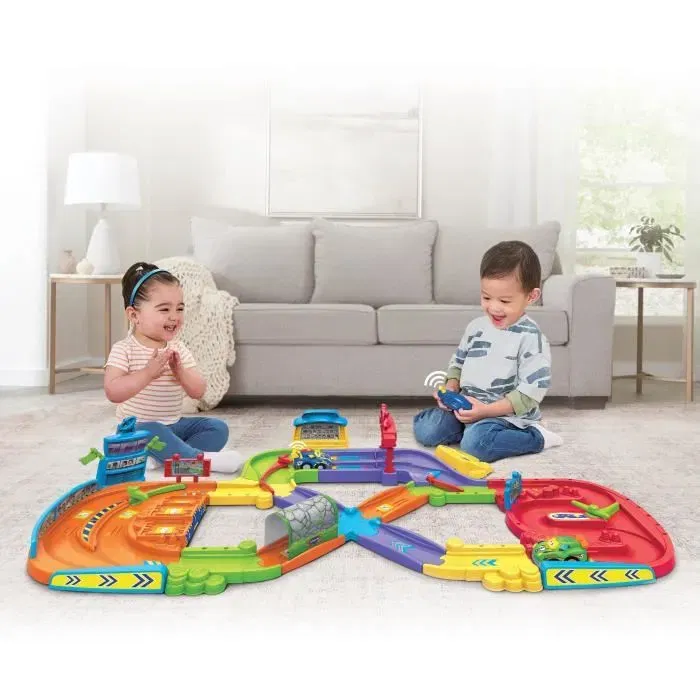 VTech Mon Premier Circuit Télécommandé Tut Tut Bolides, jeu de course pour enfants avec pistes et obstacles, français