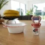 Thermobaby - Grignoteur de fruits et légumes MINNIE en silicone, jouet de dentition avec couvercle, pour bébé à partir de 10 mois, sans BPA, 6x4x11 cm