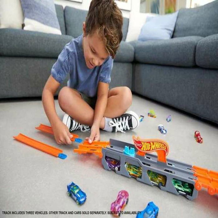 Hot Wheels Circuit Super Transporteur Extensible GVG37 avec 3 Voitures, Piste de Course 182 cm, Capacité 25 Véhicules, À Partir de 4 Ans