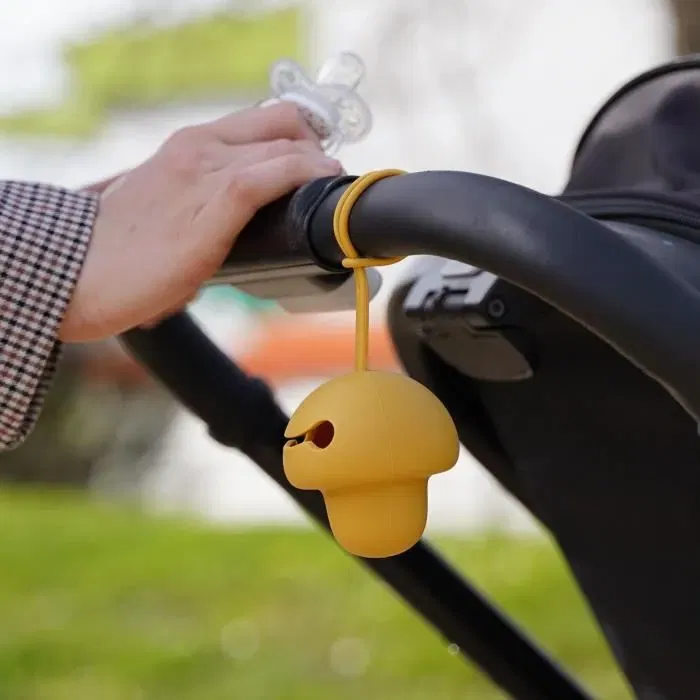 Thermobaby - Range-tétine en silicone jaune miel, sans BPA, pour sac ou poussette - Fermeture sécurisée et facile à nettoyer