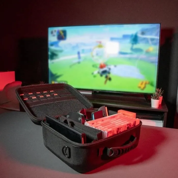 Konix Sacoche de Protection Nintendo Switch 2, Coque Rigide avec 14 Emplacements pour Cartouches de Jeu, 2 Filets de Rangement et Bandeoulière, Noir