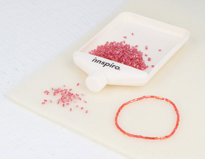 Innspiro Rocaille de verre cylindre mini aurora boreal rouge diam. 2x2mm 100gr Bote