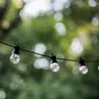 Lumi Jardin Guirlande lumineuse LED extérieure connectable - 20 globes guinguette transparents - 9.6 m - Blanc chaud - 8 modes - Résistante aux intempéries