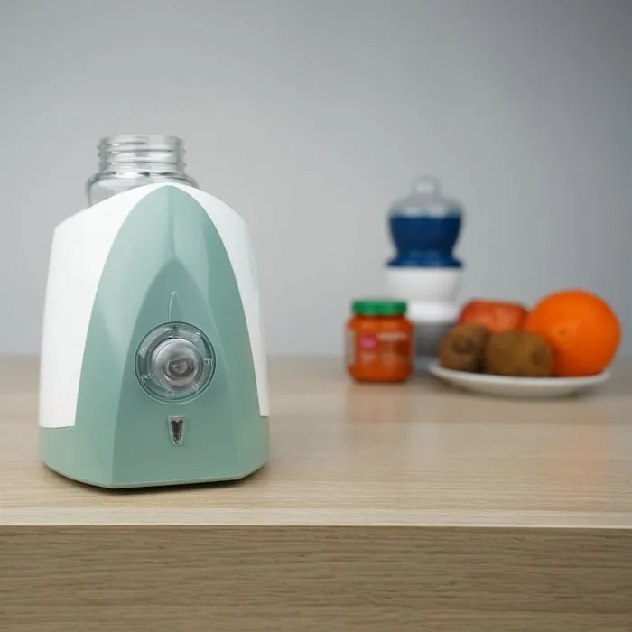 Thermobaby Chauffe-biberon - 230 V - Vert sauge - Fonctionne avec tous les modèles de biberons, chauffage doux et homogène Thermobaby Chauffe-biberon - 230 V - Vert sauge - Fonctionne avec tous les modèles de biberons, chauffage doux et homogène