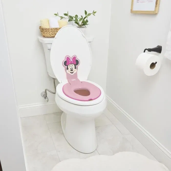 Disney Baby - Réducteur de lunette de toilette enfant Minnie - Universel, adhésif, installation rapide, siège d'apprentissage de la propreté