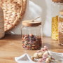 Home Deco Factory Bocal en verre borosilicate avec couvercle en acacia 55 cl