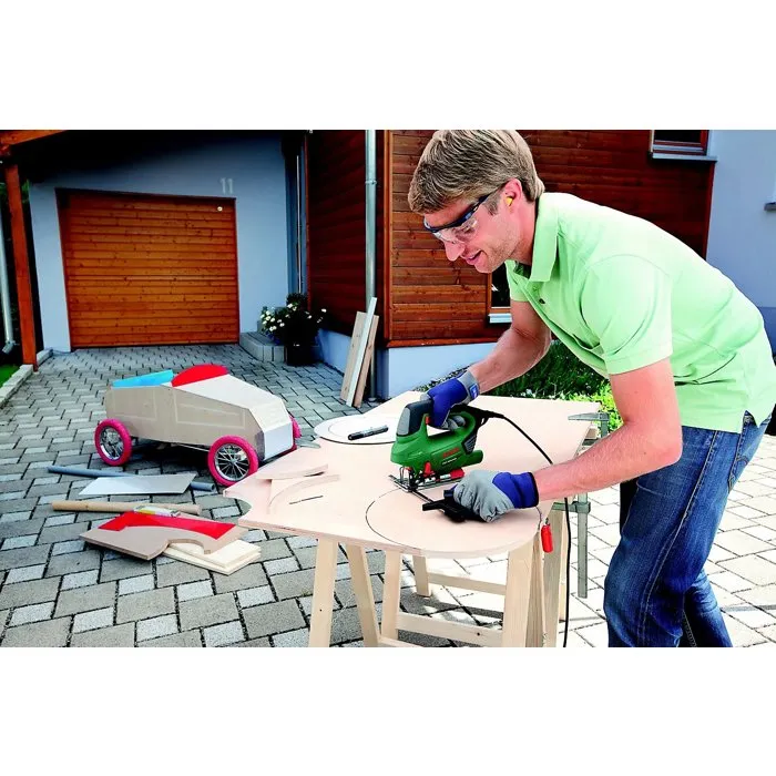 Bosch PST 900 PEL - Scie sauteuse pendulaire filaire 620W, 3100 tr/min, avec variateur électronique, fonction CutControl, PowerLight, mallette et set de 10 lames