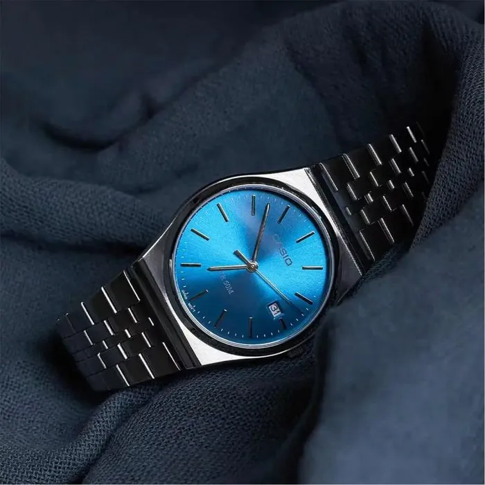 Casio MTP-B145D - Montre homme analogique quartz, cadran bleu foncé, verre minéral, bracelet inox, étanche, affichage date